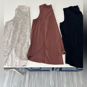 Athena sleeveless zephyr style tank . 3 colors same style and size . 1x